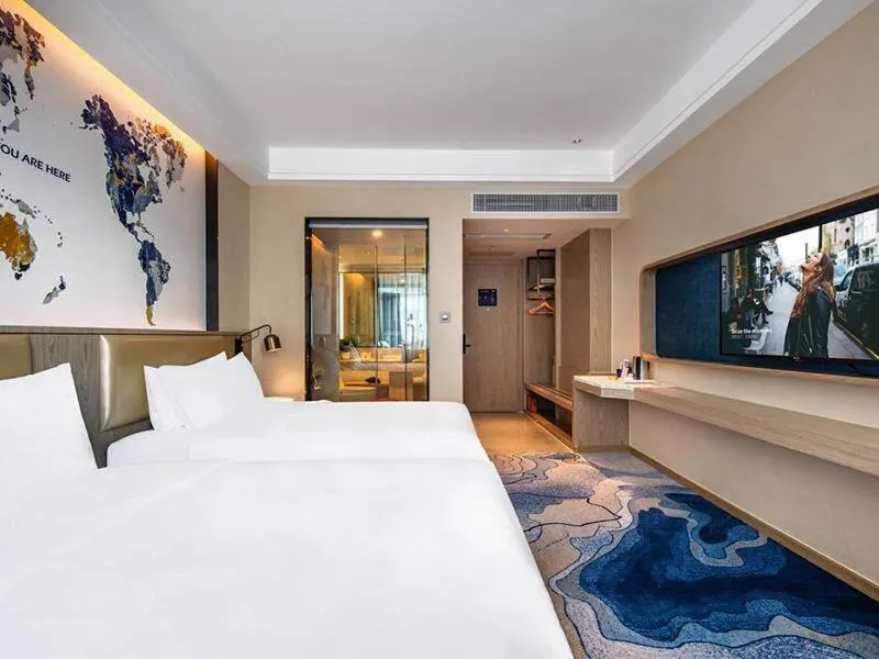Bed in Kyriad Marvelous Hotel Haifeng
