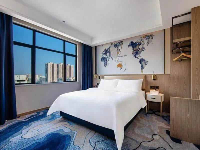 Bed in Kyriad Marvelous Hotel Haifeng