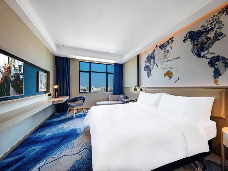 Bed in Kyriad Marvelous Hotel Haifeng