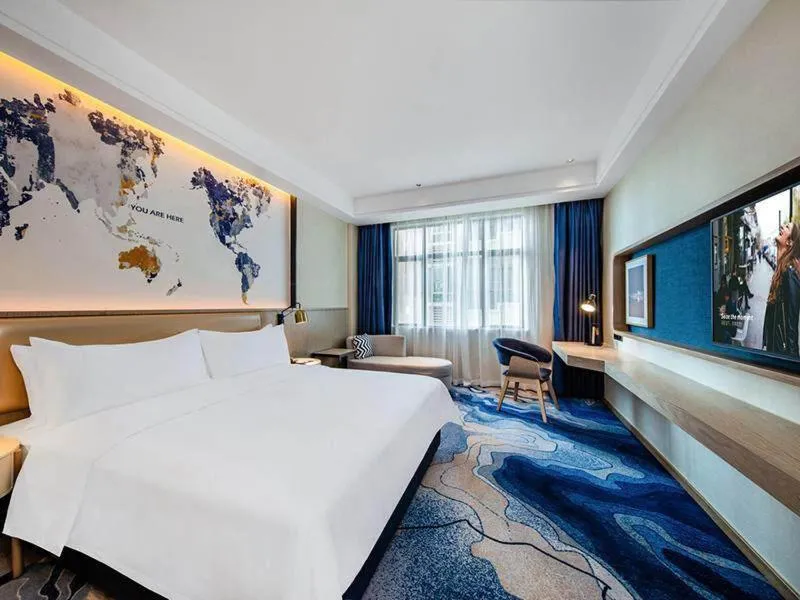 Bed in Kyriad Marvelous Hotel Haifeng