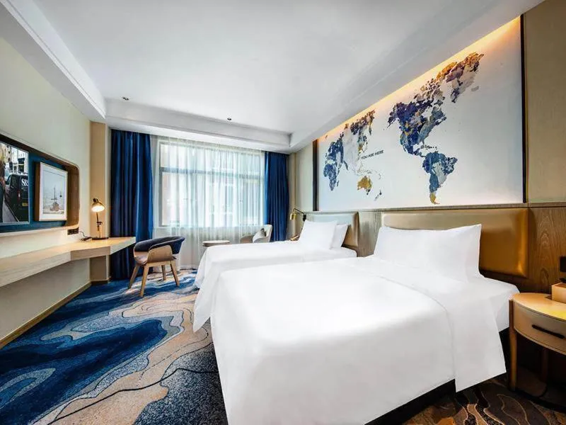 Bed in Kyriad Marvelous Hotel Haifeng