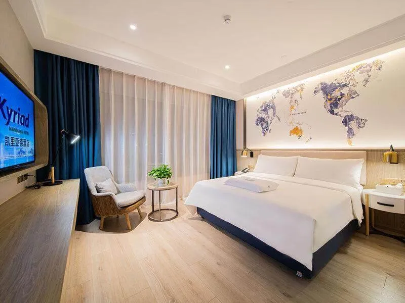 Bed in Kyriad Marvelous Hotel Heyuan Hakka Culture Park