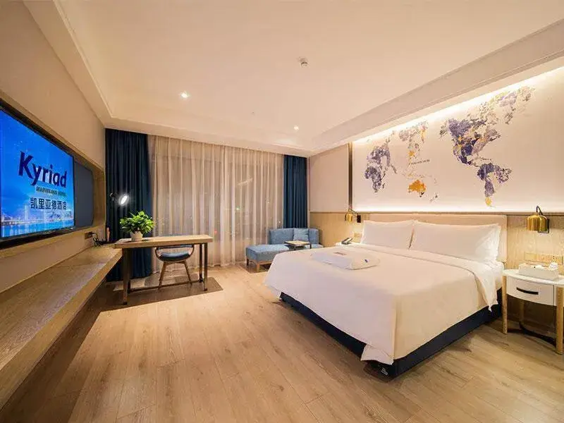 Bed in Kyriad Marvelous Hotel Heyuan Hakka Culture Park Bed in Kyriad Marvelous Hotel Heyuan Hakka Culture Park
