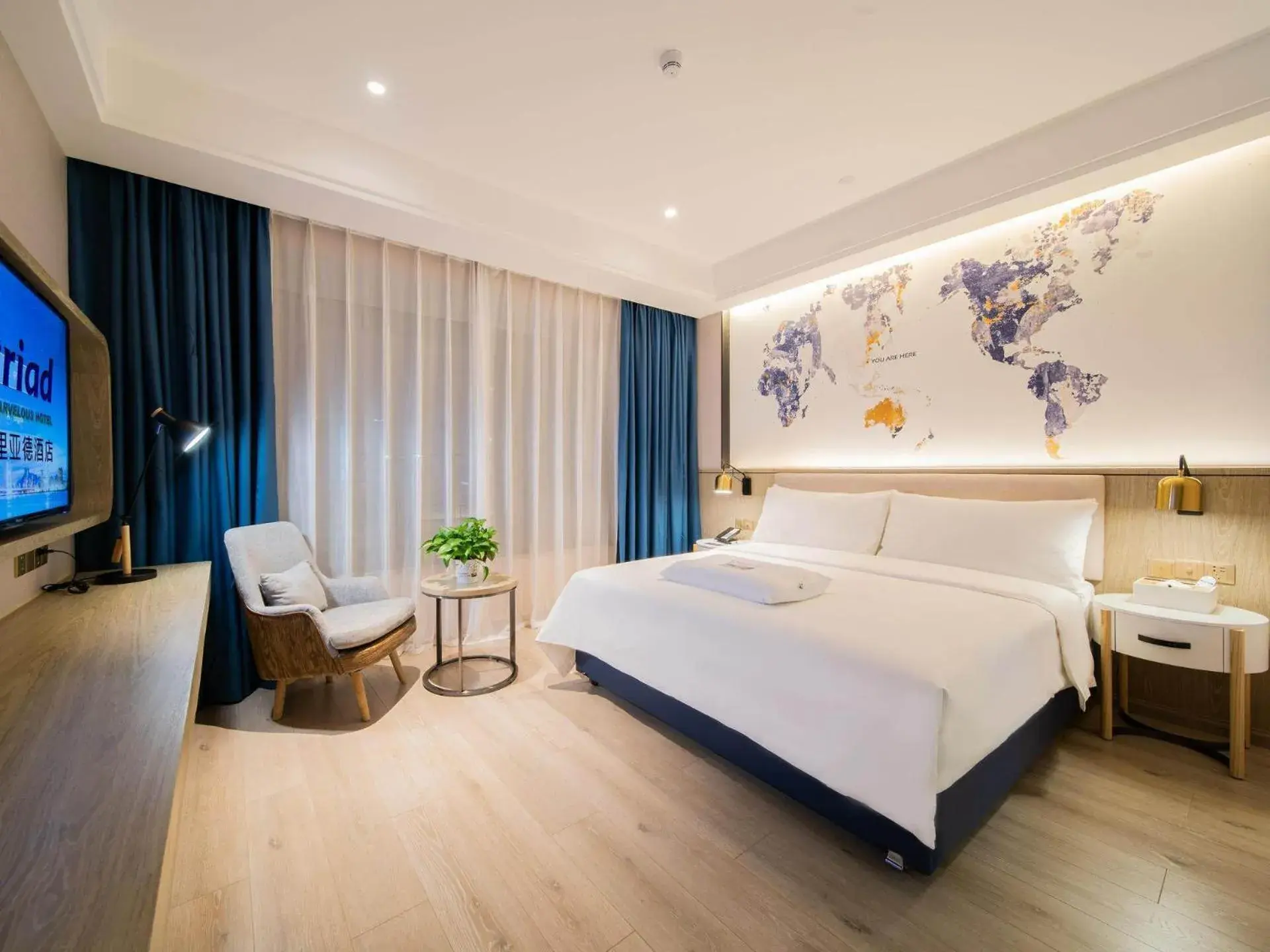 Bed in Kyriad Marvelous Hotel Heyuan Hakka Culture Park Bed in Kyriad Marvelous Hotel Heyuan Hakka Culture Park