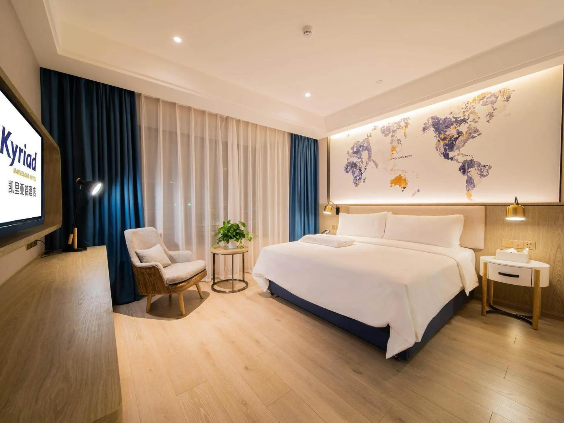 Bed in Kyriad Marvelous Hotel Heyuan Hakka Culture Park