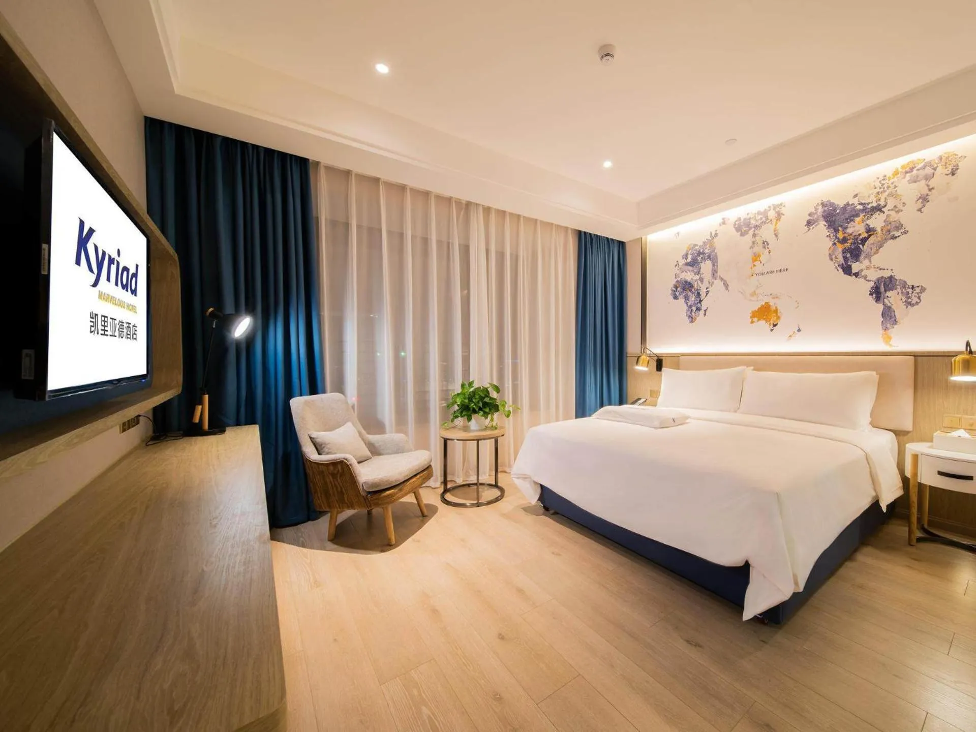 Bed in Kyriad Marvelous Hotel Heyuan Hakka Culture Park