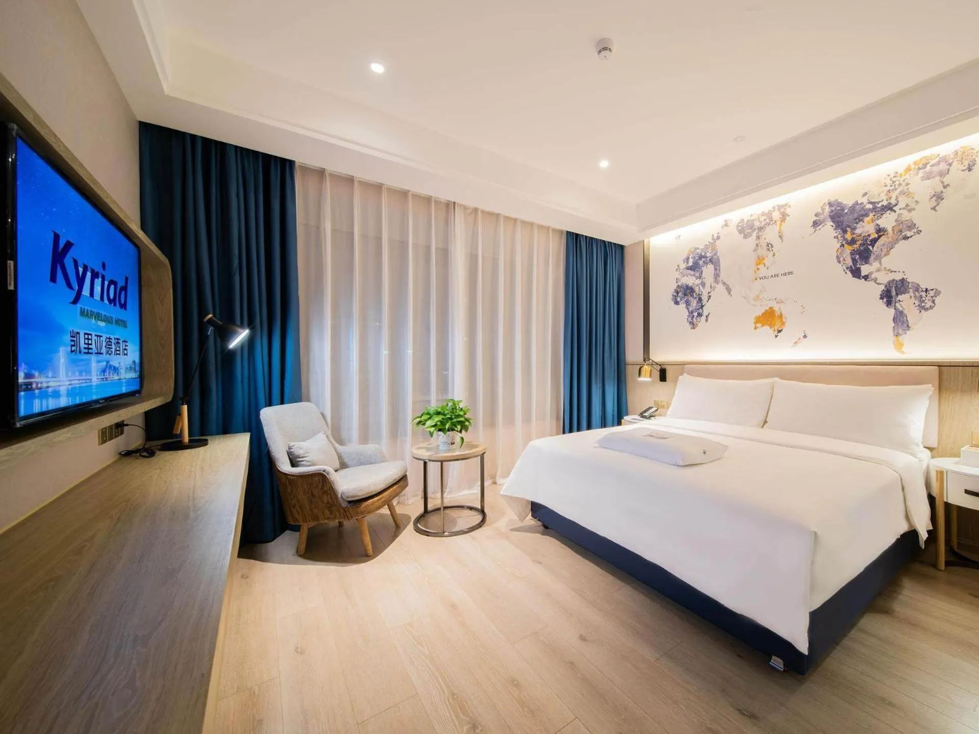 Bed in Kyriad Marvelous Hotel Heyuan Hakka Culture Park