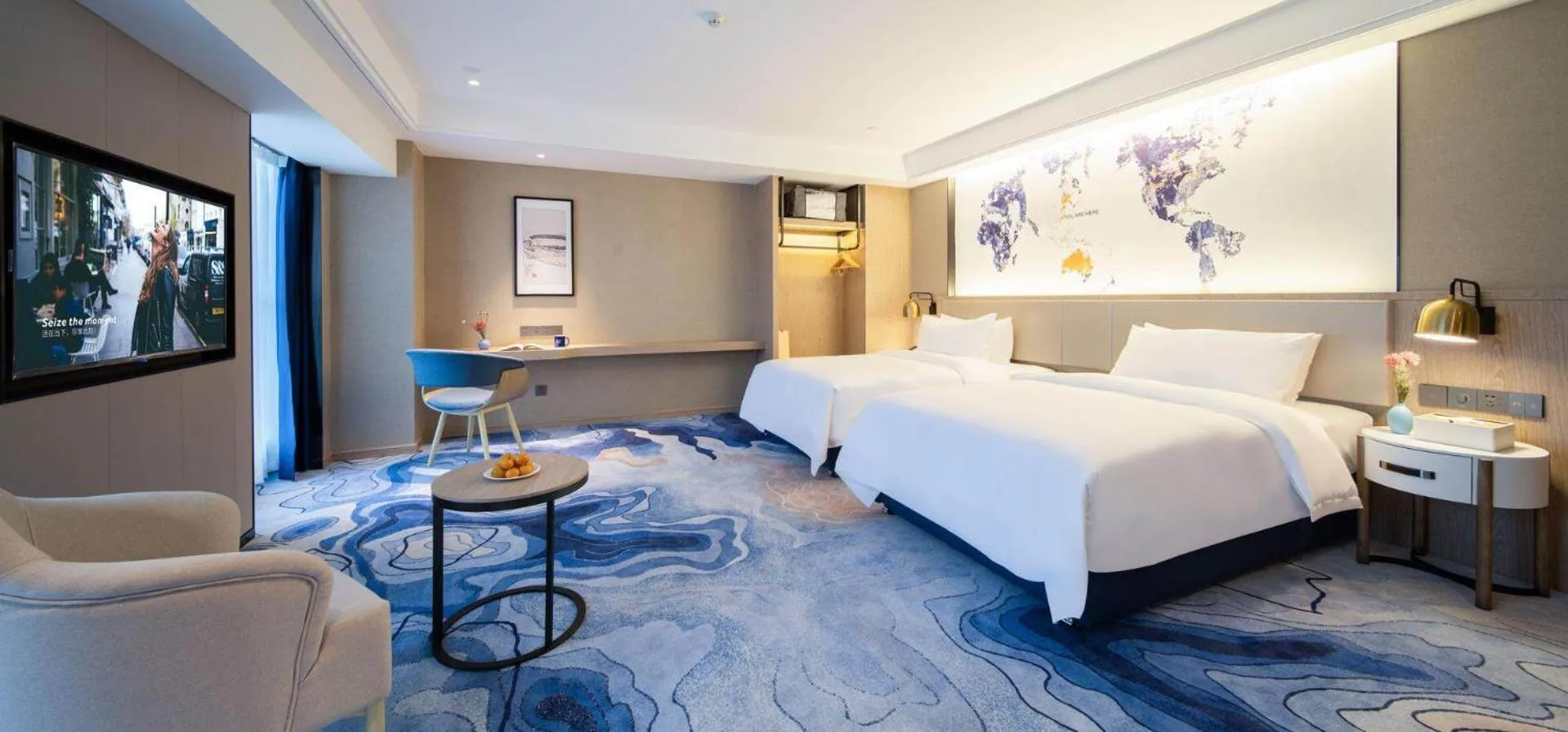 Bed in Kyriad Marvelous Hotel Heyuan Zijin Wanhui Plaza