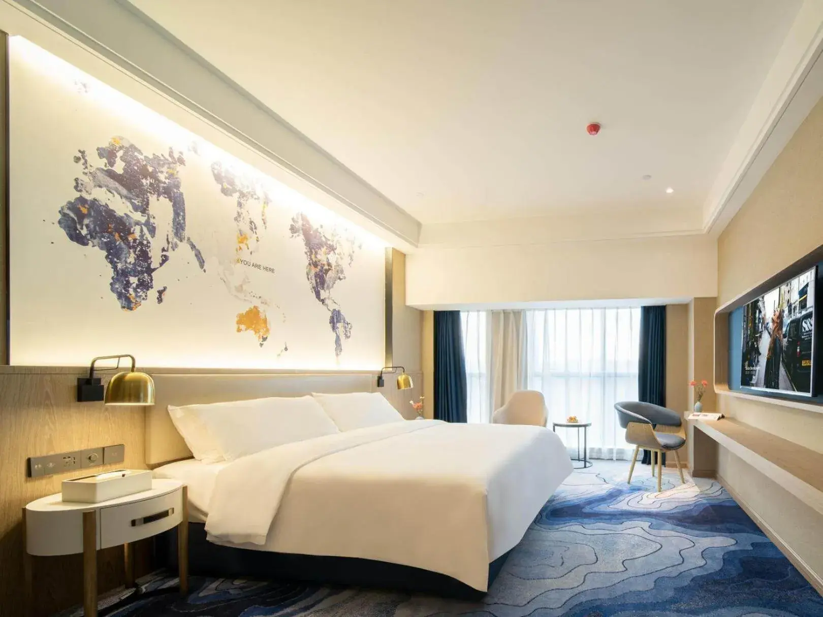 Bed in Kyriad Marvelous Hotel Heyuan Zijin Wanhui Plaza Bed in Kyriad Marvelous Hotel Heyuan Zijin Wanhui Plaza