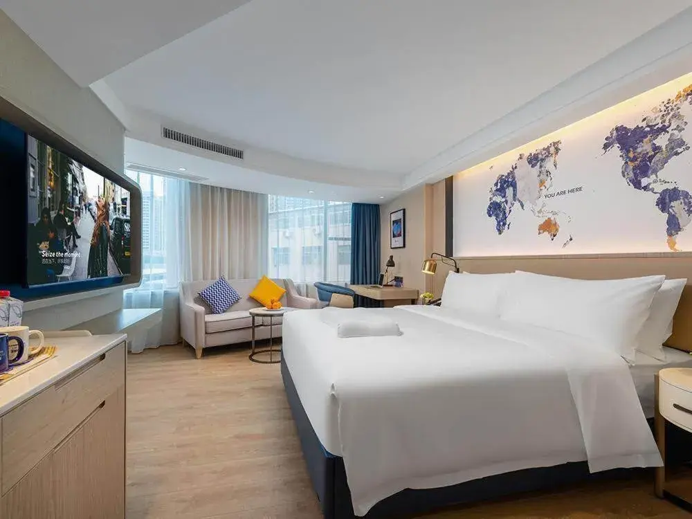 Bed in Kyriad Marvelous Hotel Shenzhen Nanlian Metro Station Bed in Kyriad Marvelous Hotel Shenzhen Nanlian Metro Station