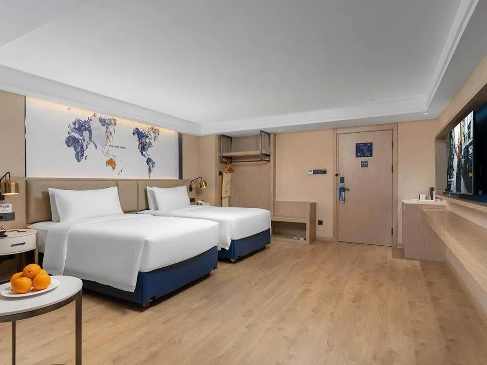 Bed in Kyriad Marvelous Hotel Shenzhen Nanlian Metro Station