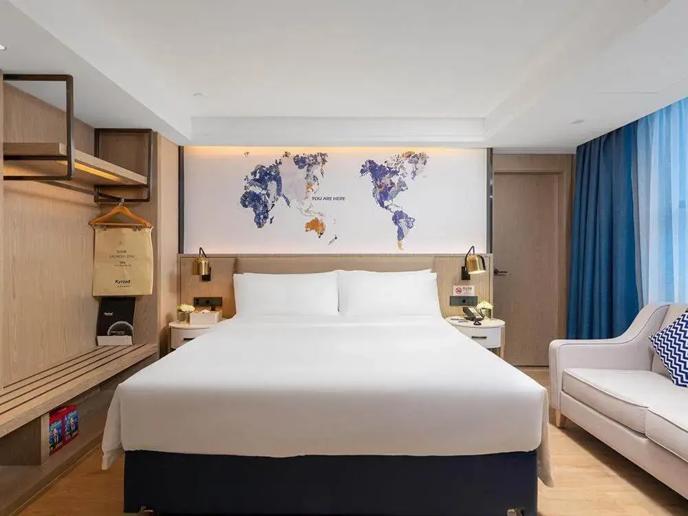 Bed in Kyriad Marvelous Hotel Shenzhen Nanlian Metro Station Bed in Kyriad Marvelous Hotel Shenzhen Nanlian Metro Station