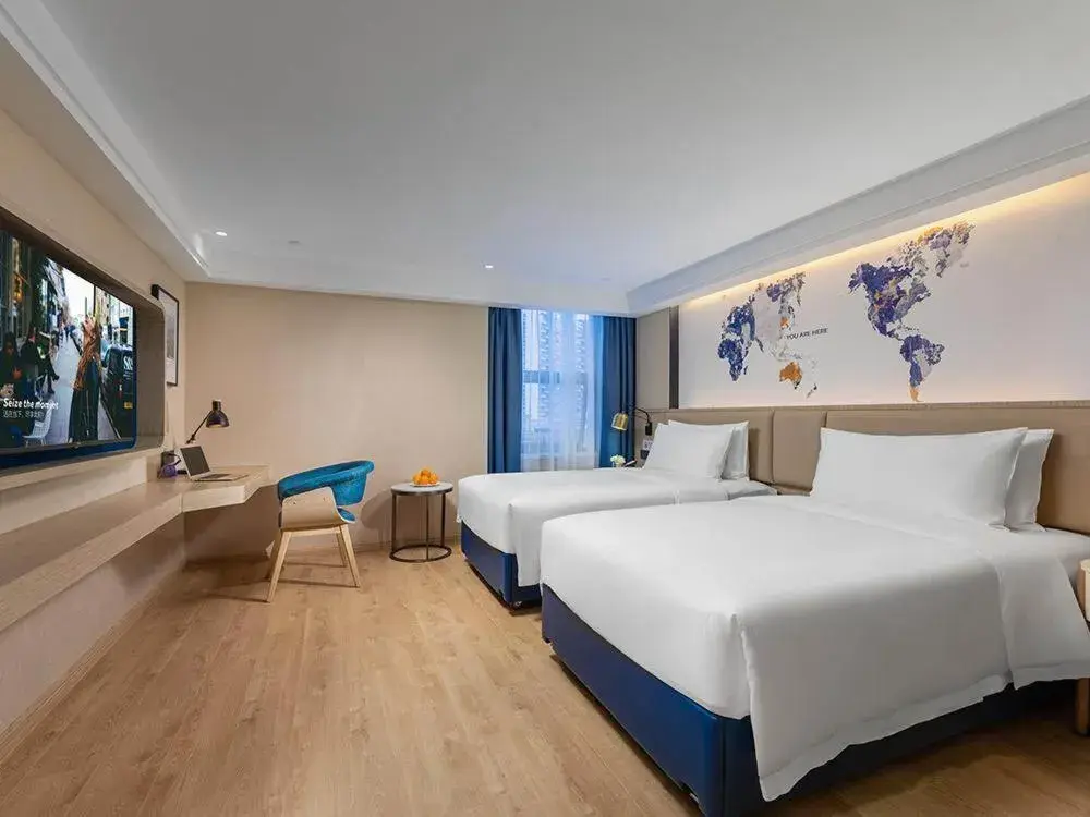 Bed in Kyriad Marvelous Hotel Shenzhen Nanlian Metro Station Bed in Kyriad Marvelous Hotel Shenzhen Nanlian Metro Station