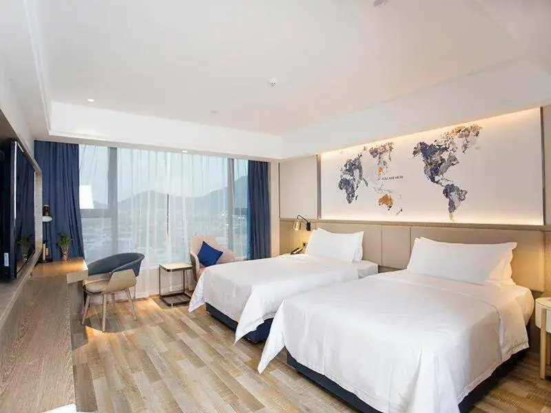 Bed in Kyriad Marvelous Hotel Foshan Xiqiao Mountain Scenic Area Qiaoling Square Bed in Kyriad Marvelous Hotel Foshan Xiqiao Mountain Scenic Area Qiaoling Square