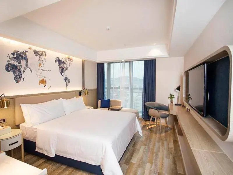 Bed in Kyriad Marvelous Hotel Foshan Xiqiao Mountain Scenic Area Qiaoling Square Bed in Kyriad Marvelous Hotel Foshan Xiqiao Mountain Scenic Area Qiaoling Square