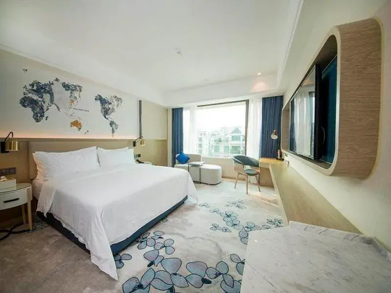 Bed in Kyriad Marvelous Hotel Foshan Xiqiao Mountain Scenic Area Qiaoling Square Bed in Kyriad Marvelous Hotel Foshan Xiqiao Mountain Scenic Area Qiaoling Square