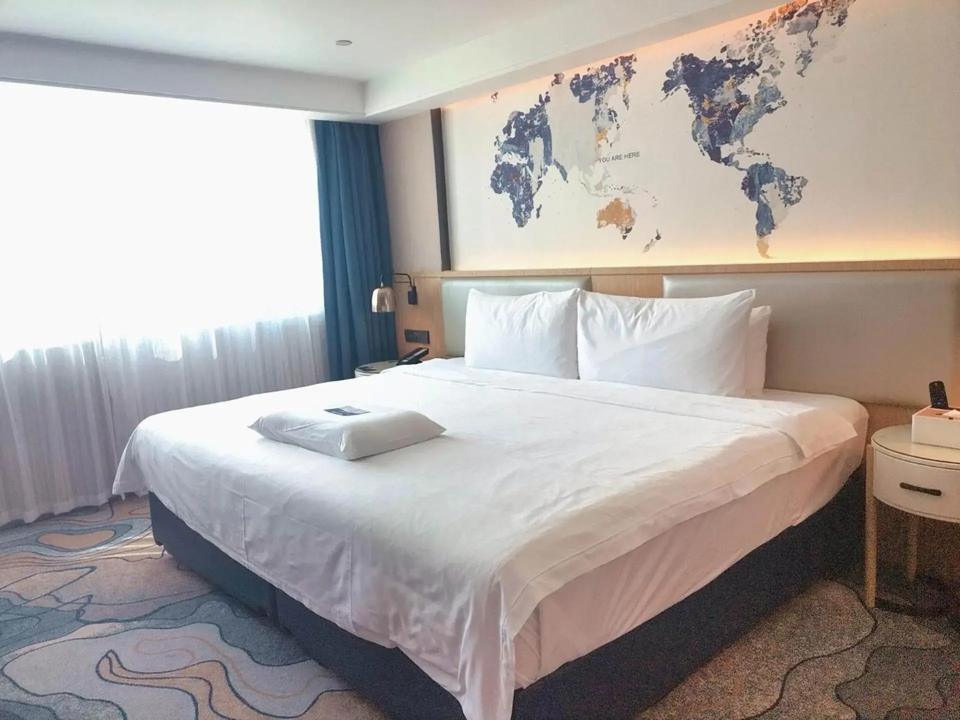 Bed in Kyriad Hotel Zhongshan University of Science and Technology Bed in Kyriad Hotel Zhongshan University of Science and Technology