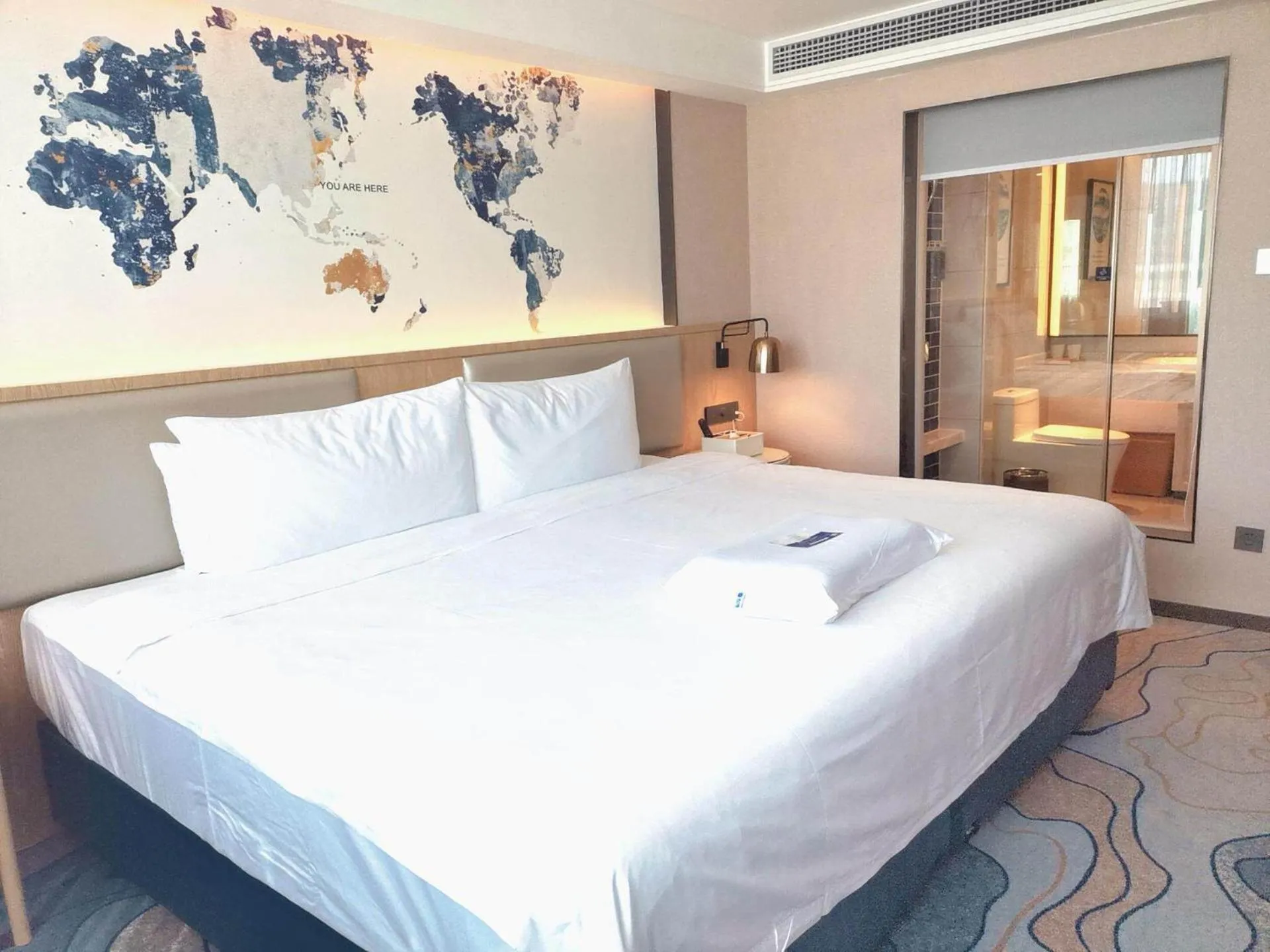 Bed in Kyriad Hotel Zhongshan University of Science and Technology