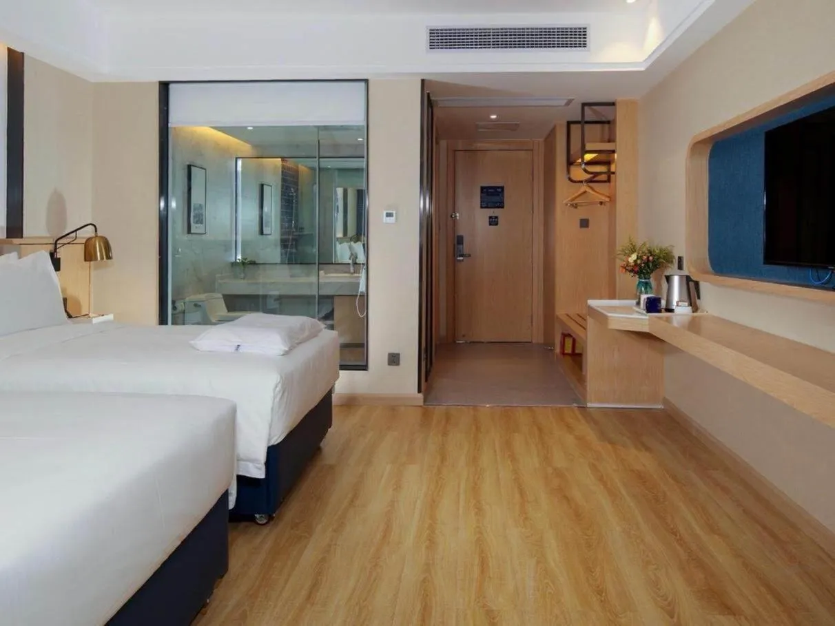 Bed in Kyriad Marvelous Hotel Zhongshan West District