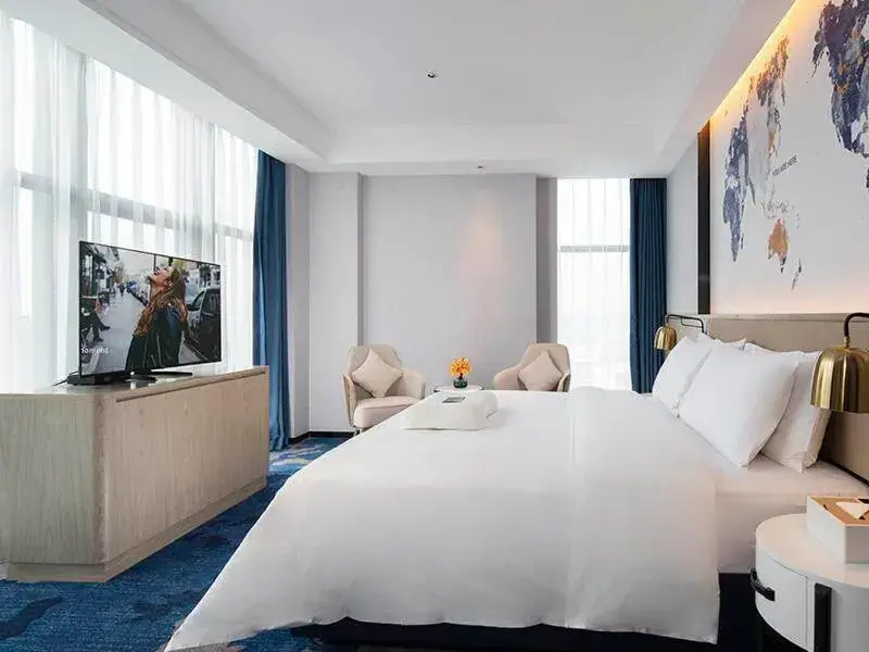 Bed in Kyriad Marvelous Hotel Fangchenggang Administration Center High-Speed Railway Station Bed in Kyriad Marvelous Hotel Fangchenggang Administration Center High-Speed Railway Station