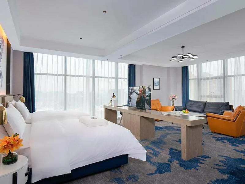 Bed in Kyriad Marvelous Hotel Fangchenggang Administration Center High-Speed Railway Station