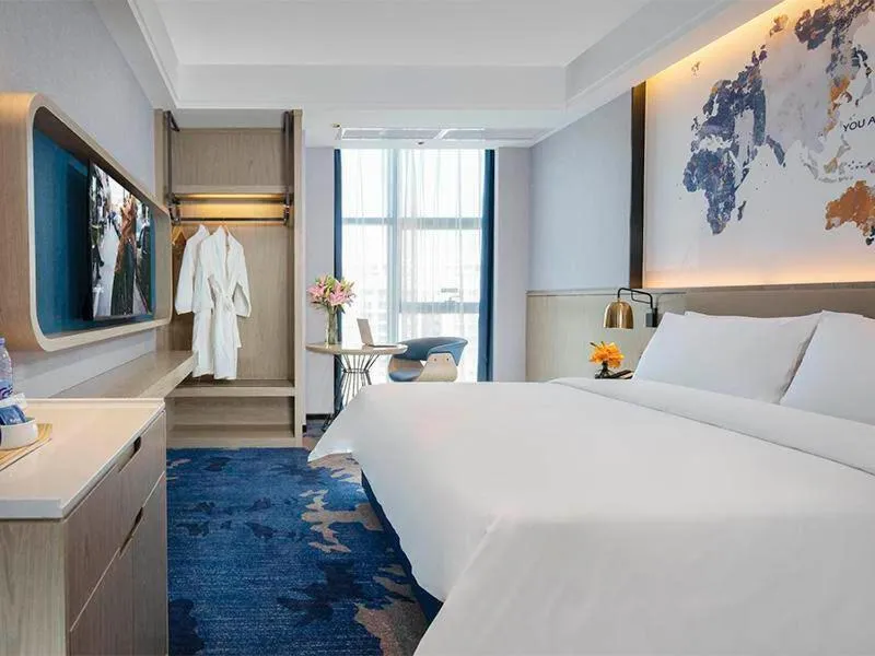 Bed in Kyriad Marvelous Hotel Fangchenggang Administration Center High-Speed Railway Station