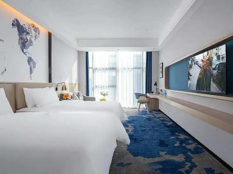 Bed in Kyriad Marvelous Hotel Fangchenggang Administration Center High-Speed Railway Station Bed in Kyriad Marvelous Hotel Fangchenggang Administration Center High-Speed Railway Station