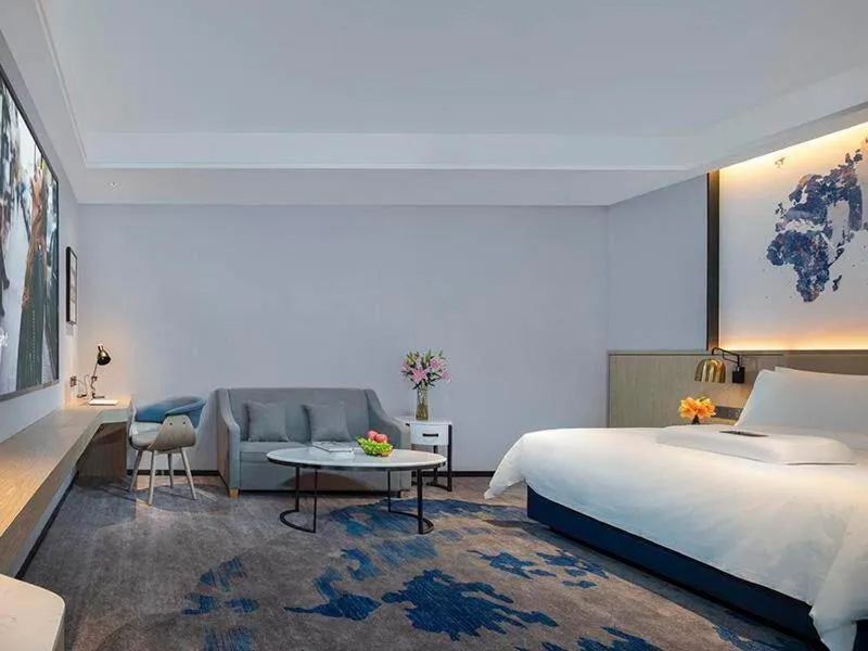 Bed in Kyriad Marvelous Hotel Fangchenggang Administration Center High-Speed Railway Station