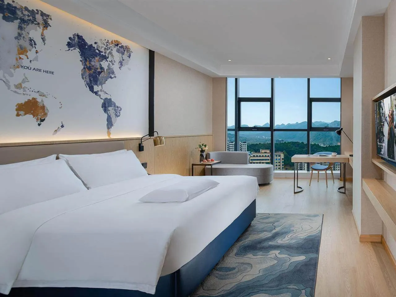 Bed in Kyriad Marvelous Hotel Guilin Quanzhou