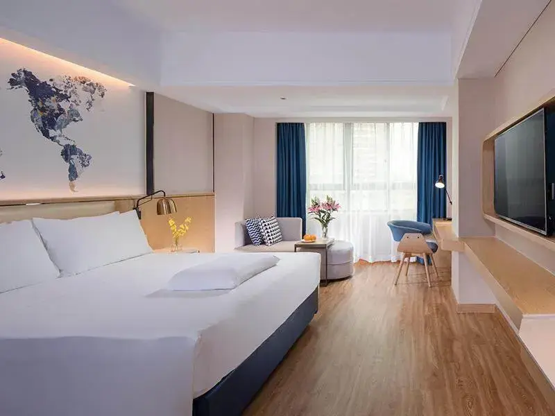 Bed in Kyriad Marvelous Hotel Haikou Free Trade Zone Bed in Kyriad Marvelous Hotel Haikou Free Trade Zone