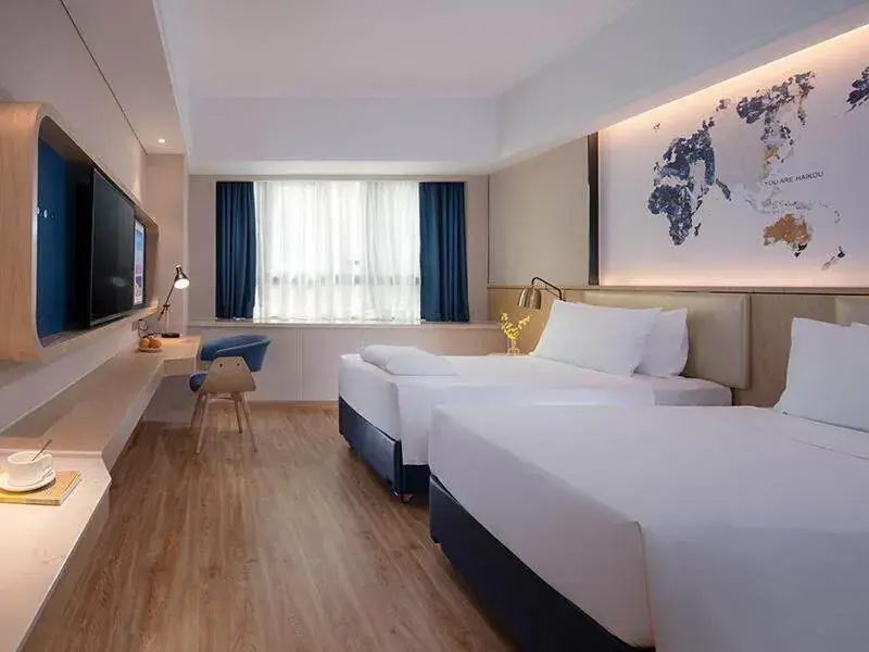 Bed in Kyriad Marvelous Hotel Haikou Free Trade Zone Bed in Kyriad Marvelous Hotel Haikou Free Trade Zone