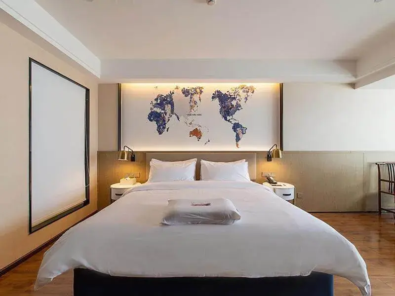 Bed in Kyriad Marvelous Hotel Kunming High-Tech Zone Wuyue Plaza Bed in Kyriad Marvelous Hotel Kunming High-Tech Zone Wuyue Plaza