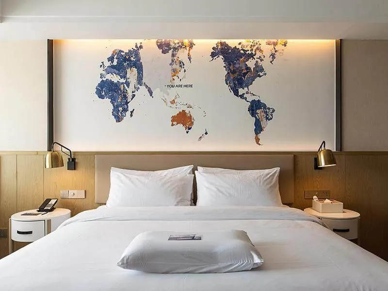 Bed in Kyriad Marvelous Hotel Kunming High-Tech Zone Wuyue Plaza