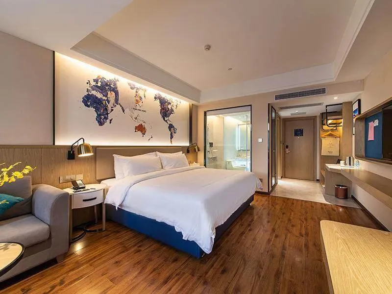 Bed in Kyriad Marvelous Hotel Kunming High-Tech Zone Wuyue Plaza