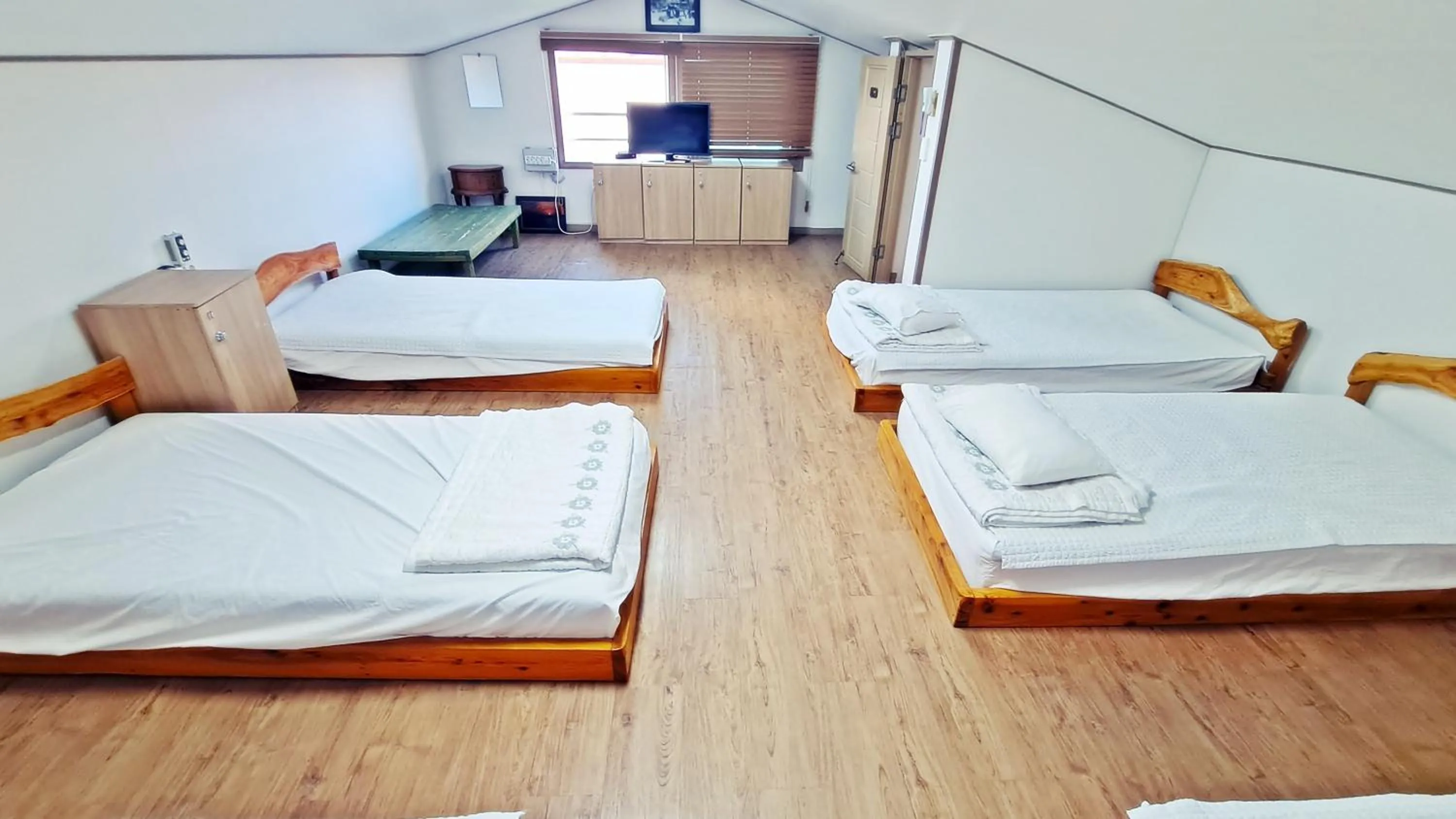 Bed in Jeju Gillime Pension