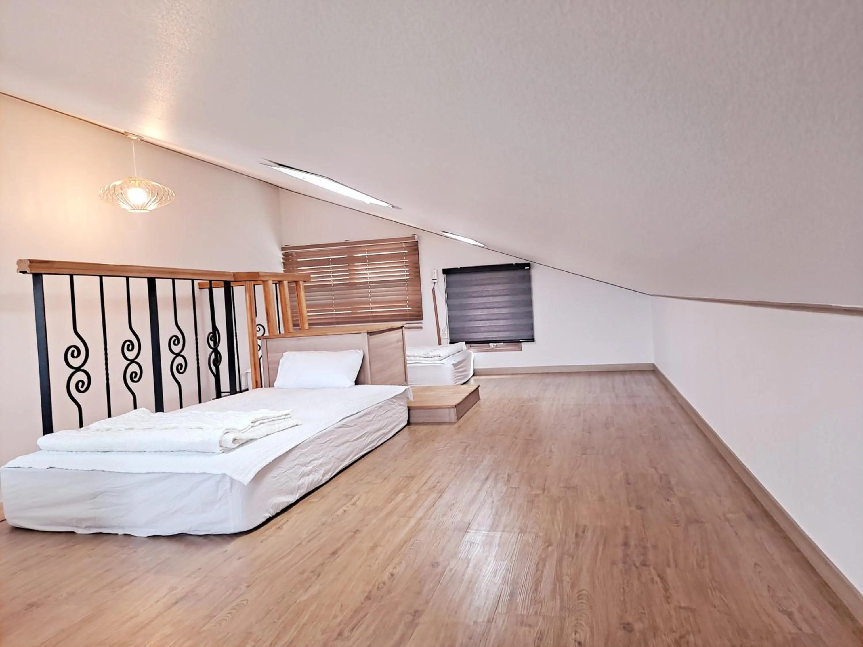 Bed in Jeju Gillime Pension