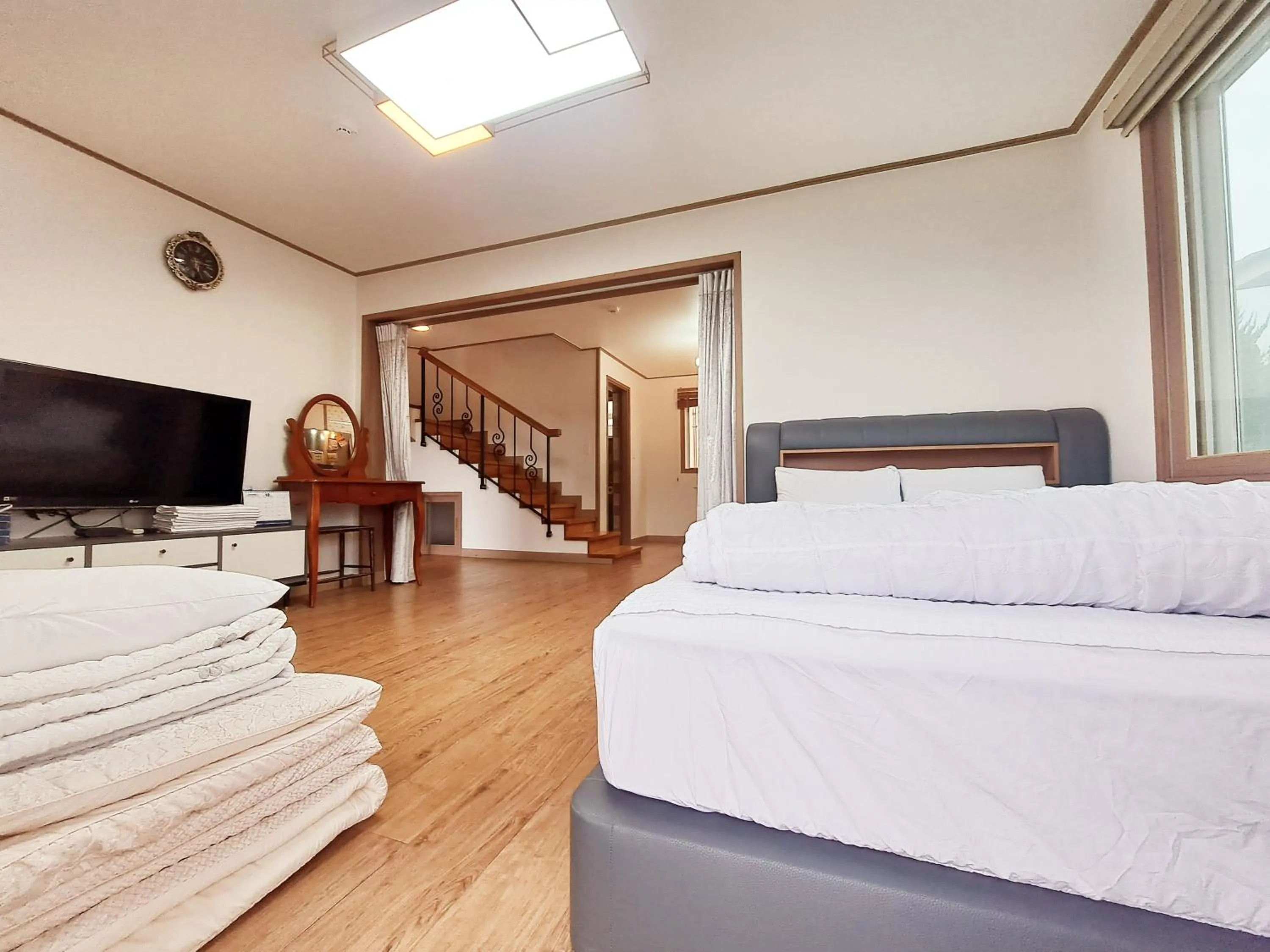 Bed in Jeju Gillime Pension