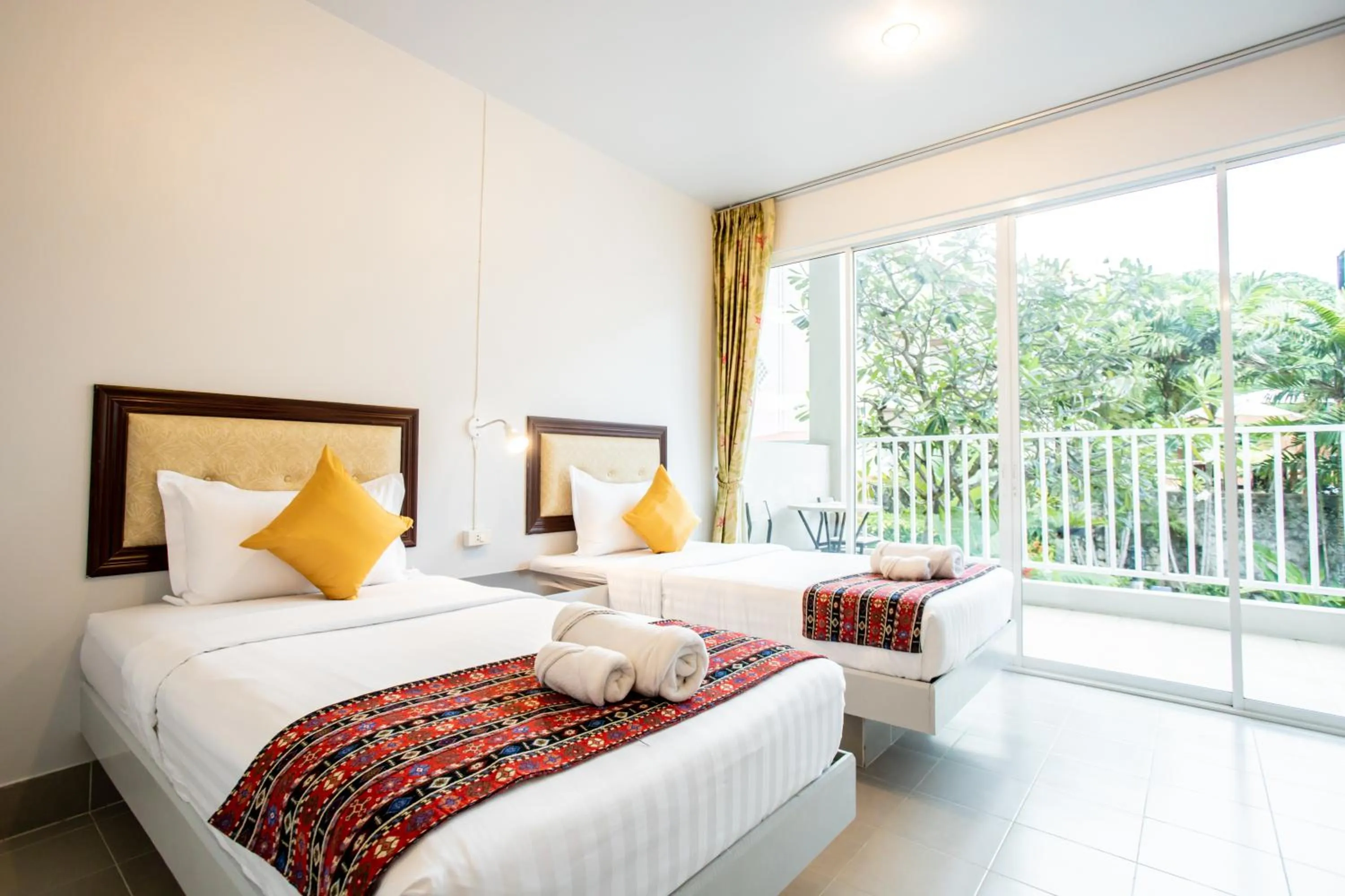 Bed in Tri's Miracle Kata Beach Side