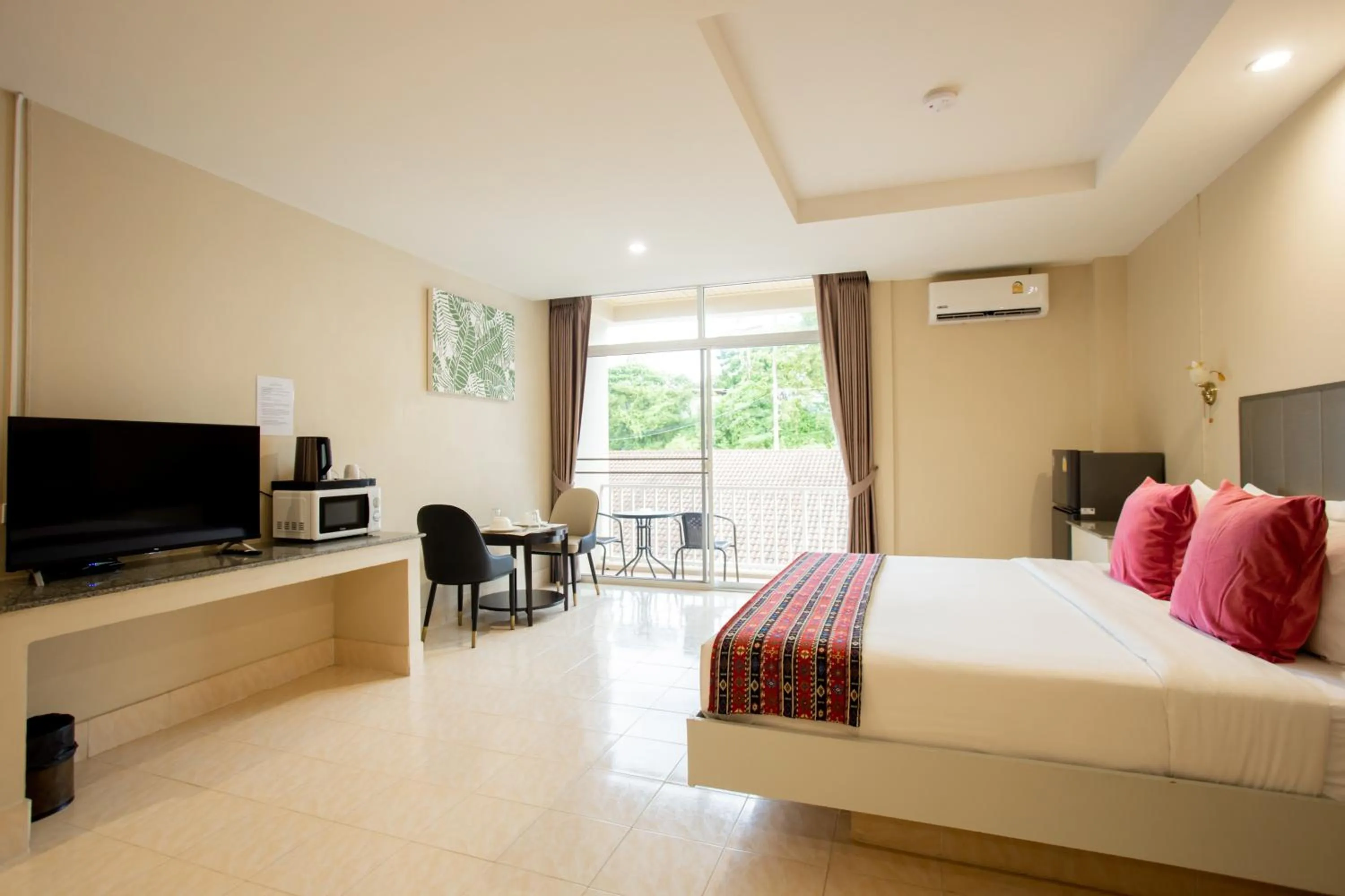 Bed in Tri's Miracle Kata Beach Side