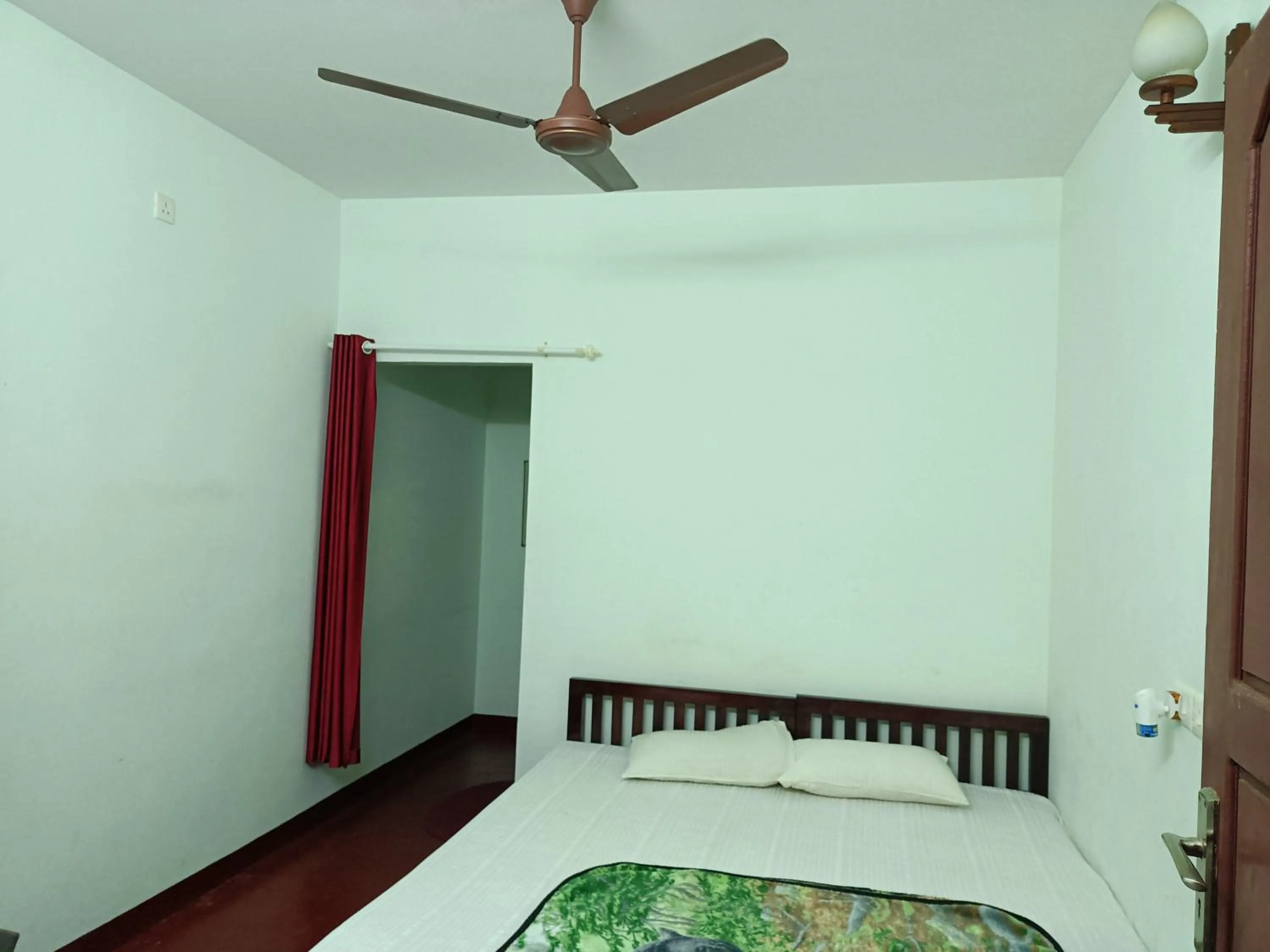 Bed in Angels' homestay Marari