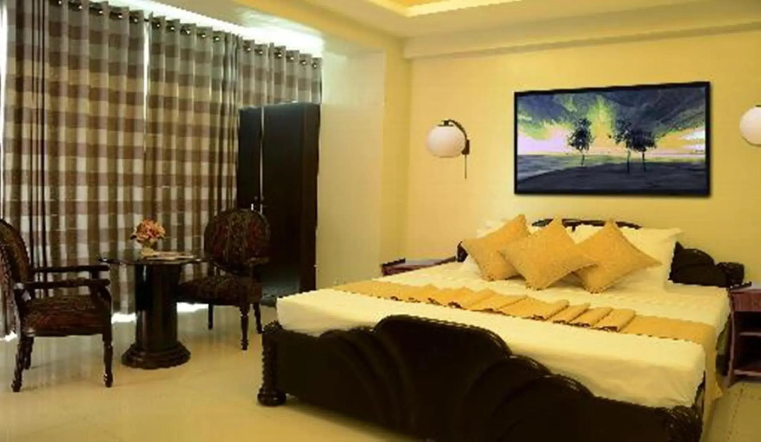 Photo of the whole room, Bed in Silver Oaks Suites & Hotel Photo of the whole room, Bed in Silver Oaks Suites & Hotel