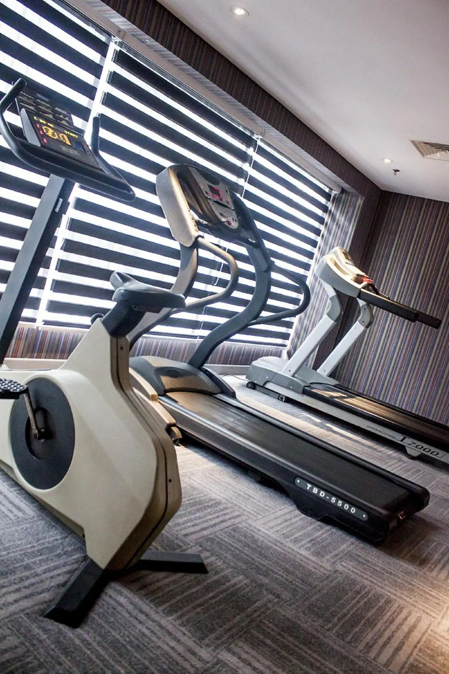 Fitness centre/facilities in CROWN PRINCE Hotel Surabaya Managed by Midtown Indonesia Fitness centre/facilities in CROWN PRINCE Hotel Surabaya Managed by Midtown Indonesia