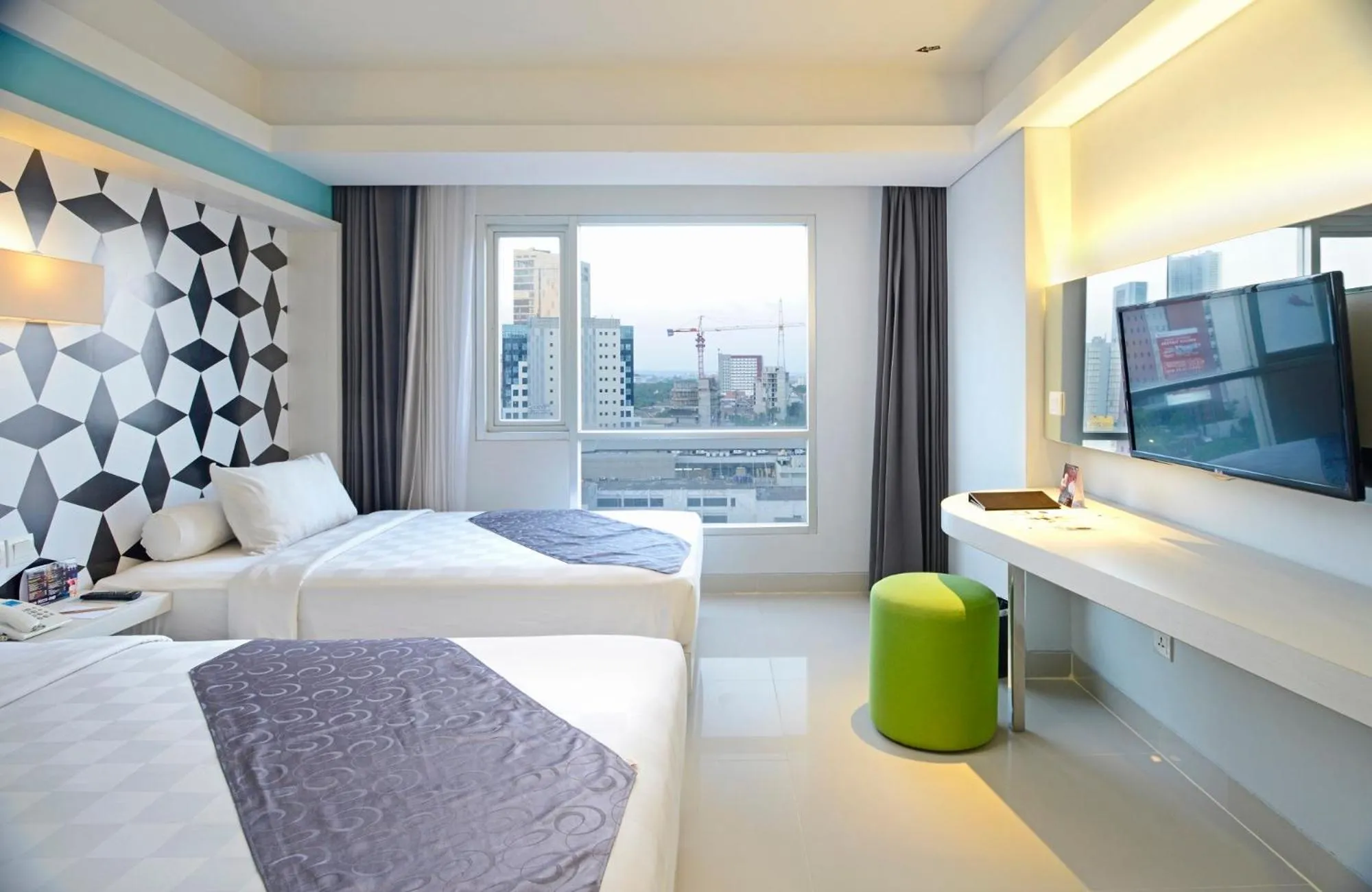 Bed in CROWN PRINCE Hotel Surabaya Managed by Midtown Indonesia