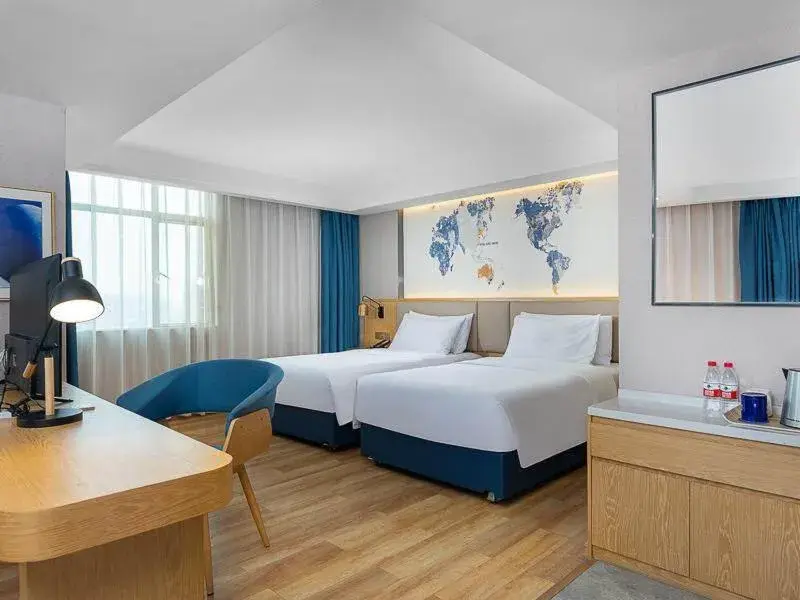 Bed in Kyriad Marvelous Hotel Dongguan Changan Light Rail Station Bed in Kyriad Marvelous Hotel Dongguan Changan Light Rail Station