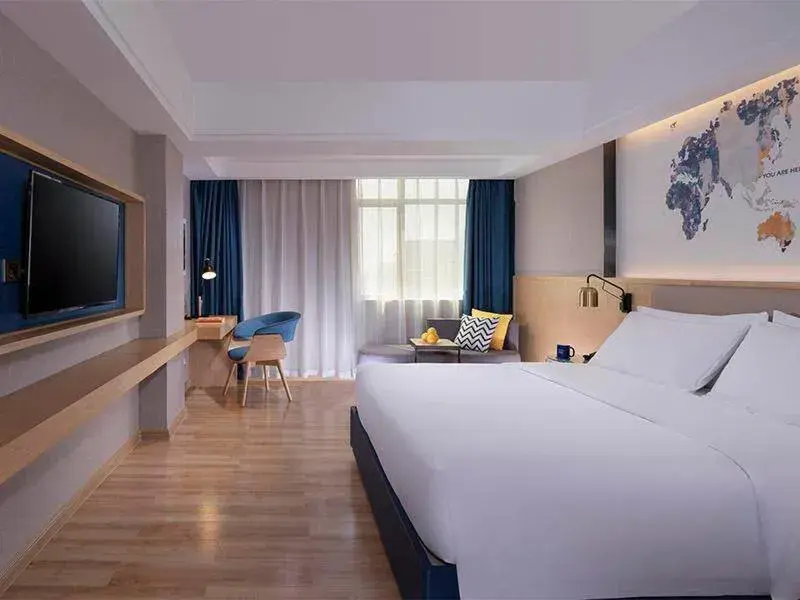 Bed in Kyriad Marvelous Hotel Dongguan Changan Light Rail Station Bed in Kyriad Marvelous Hotel Dongguan Changan Light Rail Station