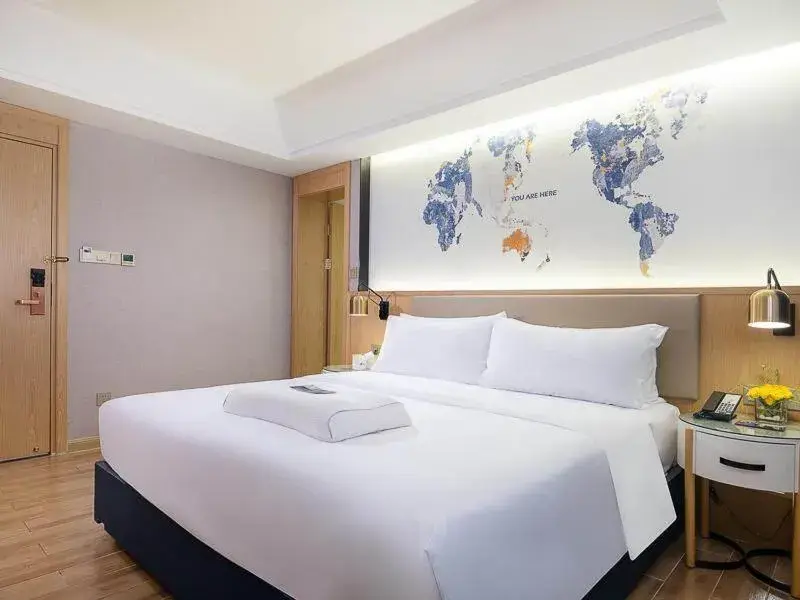 Bed in Kyriad Marvelous Hotel Dongguan Changan Light Rail Station Bed in Kyriad Marvelous Hotel Dongguan Changan Light Rail Station