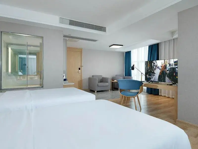 Bed in Kyriad Marvelous Hotel Dongguan Changan Light Rail Station Bed in Kyriad Marvelous Hotel Dongguan Changan Light Rail Station