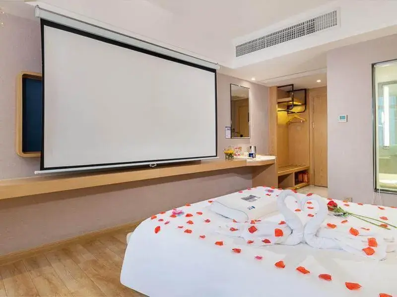 Bed in Kyriad Marvelous Hotel Dongguan Changan Light Rail Station Bed in Kyriad Marvelous Hotel Dongguan Changan Light Rail Station