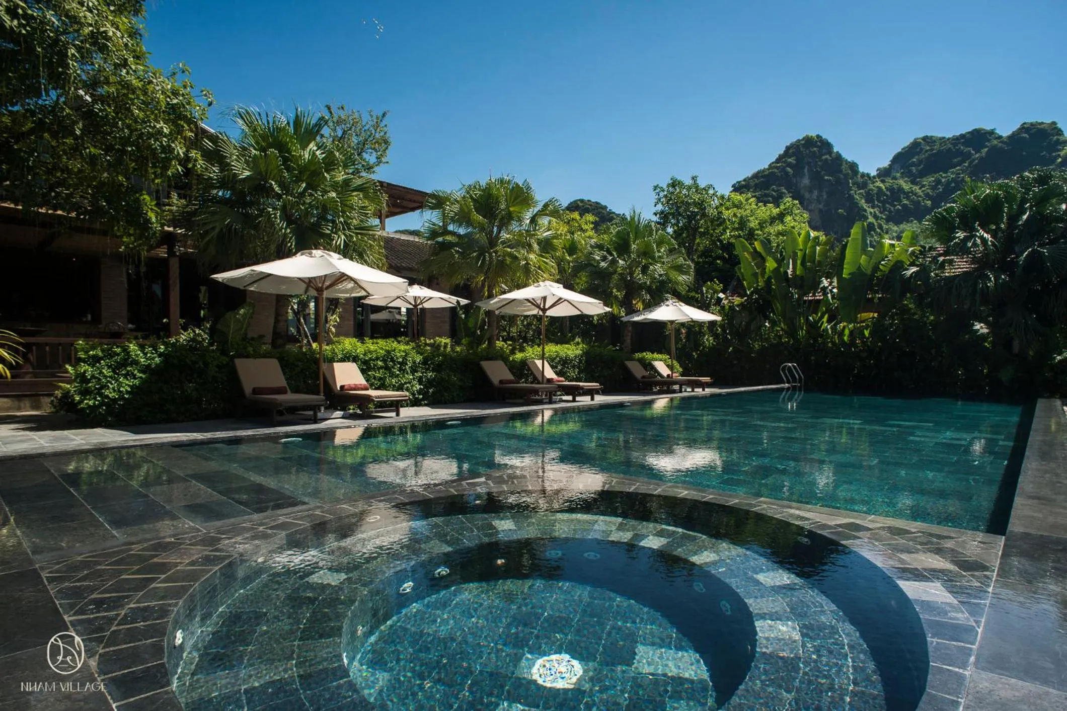 Swimming pool in Nham Village Resort