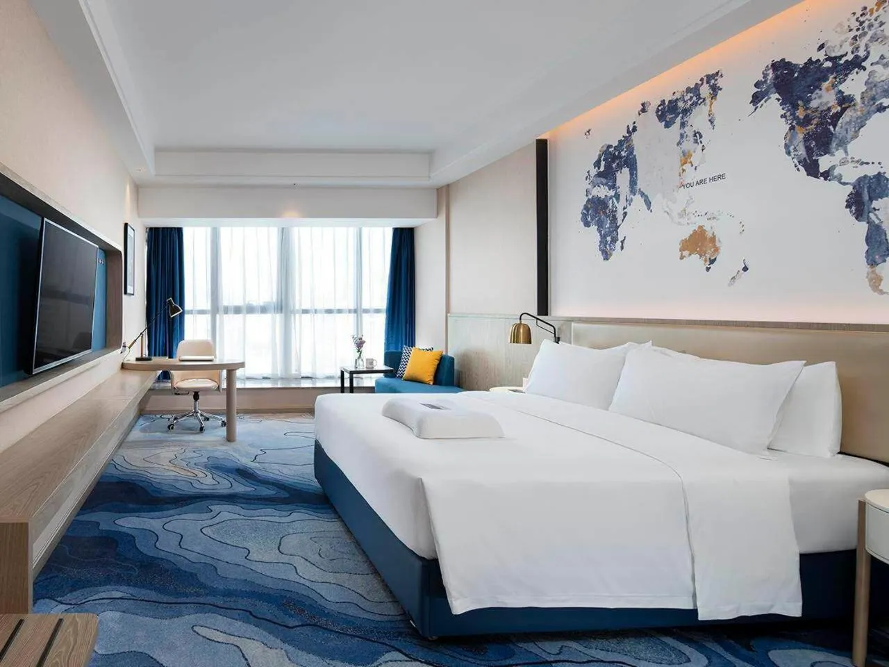 Bed in Kyriad Marvelous Hotel Shenzhen Longhua District Qinghu Subway Station